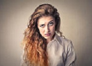 stock-photo-portrait-of-puzzled-woman-147820013